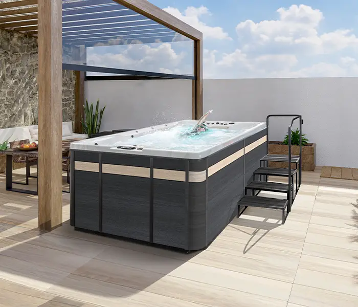 Hot Tubs, Spas, Portable Spas, Swim Spas for Sale Hot Tubs, Spas, Portable Spas, Swim Spas for Sale Calspas hot tub being used in a family setting